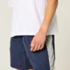 Pantaloni scurți de fotbal largi, până la jumătatea coapsei Pantaloni scurți de fotbal largi, până la jumătatea coapsei