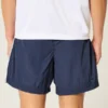 Pantaloni scurți de fotbal largi, până la jumătatea coapsei Pantaloni scurți de fotbal largi, până la jumătatea coapsei
