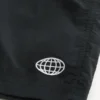 Pantaloni scurți de fotbal largi, până la jumătatea coapsei Pantaloni scurți de fotbal largi, până la jumătatea coapsei
