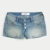 Pantaloni scurți din denim cu talie ultra joasă și spălare medie Pantaloni scurți din denim cu talie ultra joasă și spălare medie