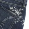 Pantaloni scurți din denim cu talie ultra joasă, spălați în culoare închisă, cu broderie fluture Pantaloni scurți din denim cu talie ultra joasă, spălați în culoare închisă, cu broderie fluture