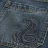 Pantaloni scurți din denim largi cu imprimeu șarpe Pantaloni scurți din denim largi cu imprimeu șarpe