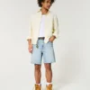 Pantaloni scurți din denim largi, deasupra genunchiului, cu aspect uzat Pantaloni scurți din denim largi, deasupra genunchiului, cu aspect uzat