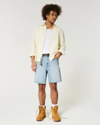 Pantaloni scurți din denim largi, deasupra genunchiului, cu aspect uzat