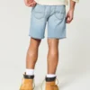 Pantaloni scurți din denim largi, deasupra genunchiului, cu aspect uzat Pantaloni scurți din denim largi, deasupra genunchiului, cu aspect uzat