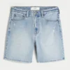 Pantaloni scurți din denim largi, deasupra genunchiului, cu aspect uzat Pantaloni scurți din denim largi, deasupra genunchiului, cu aspect uzat