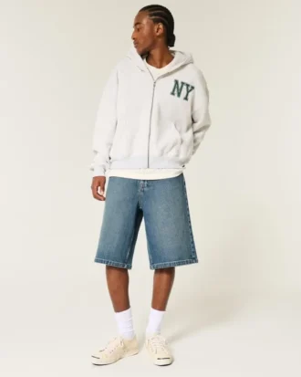 Pantaloni scurți din denim super largi, de culoare închisă, până sub genunchi