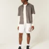 Pantaloni scurți din fleece cu imprimeu grafic Longhorns de la Universitatea din Texas, Austin Pantaloni scurți din fleece cu imprimeu grafic Longhorns de la Universitatea din Texas, Austin