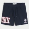 Pantaloni scurți din fleece până la jumătatea coapsei cu grafică UConn Huskies Pantaloni scurți din fleece până la jumătatea coapsei cu grafică UConn Huskies