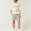 Pantaloni scurți din seersucker până la jumătatea coapsei Pantaloni scurți din seersucker până la jumătatea coapsei
