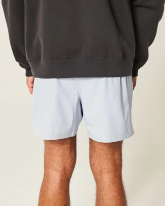 Pantaloni scurți sport cu logo la jumătatea coapsei