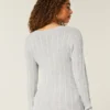 Pulover cu guler în V și model tricotat Pulover cu guler în V și model tricotat