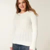 Pulover cu guler rotund și model tricotat Pulover cu guler rotund și model tricotat