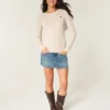 Pulover cu guler rotund și model tricotat în formă de inimă Pulover cu guler rotund și model tricotat în formă de inimă