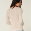 Pulover cu guler rotund și model tricotat în formă de inimă Pulover cu guler rotund și model tricotat în formă de inimă