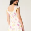 Rochie cu fustă-pantalon și mâneci fluturate Rochie cu fustă-pantalon și mâneci fluturate