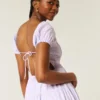 Rochie maxi cu mâneci scurte și spate decupat Rochie maxi cu mâneci scurte și spate decupat