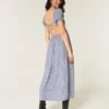 Rochie maxi cu mâneci scurte și spate decupat Rochie maxi cu mâneci scurte și spate decupat