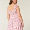 Rochie mini asimetrică cu umeri decupați Rochie mini asimetrică cu umeri decupați