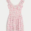 Rochie mini asimetrică cu umeri decupați Rochie mini asimetrică cu umeri decupați