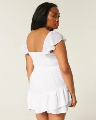 Rochie mini cu fustă-pantalon, mâneci fluturate și bust strâns