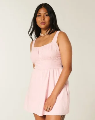 Rochie mini cu nasturi în față