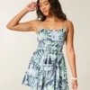 Rochie mini strălucitoare cu smocuri