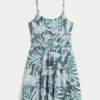 Rochie mini strălucitoare cu smocuri