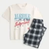 Set tricou cu imprimeu elvețian și pantaloni de pijama din flanel Set tricou cu imprimeu elvețian și pantaloni de pijama din flanel