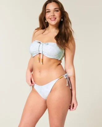 Slip bikini îndrăzneț cu șnur lateral reversibil