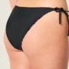 Slip bikini îndrăzneț cu șnur lateral reversibil