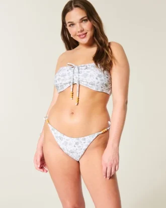 Slip bikini reversibil cu șnur lateral