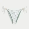 Slip bikini reversibil cu șnur lateral