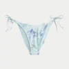 Slip de bikini îndrăzneț, cu detaliu croșetat și legături laterale