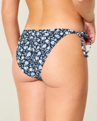 Slip de bikini îndrăzneț, cu detaliu croșetat și legături laterale