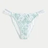 Slip de bikini îndrăzneț cu două bretele și bordură în stil croșetat