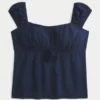 Top babydoll cu umeri decupați Top babydoll cu umeri decupați