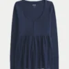 Top babydoll Henley cu legături în spate Top babydoll Henley cu legături în spate