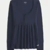 Top babydoll Henley cu legături în spate Top babydoll Henley cu legături în spate