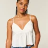 Top babydoll ușor brodat și strălucitor Top babydoll ușor brodat și strălucitor