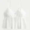 Top babydoll ușor brodat și strălucitor Top babydoll ușor brodat și strălucitor