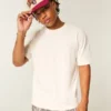 Tricou cu guler rotund, croi drept, gros, cu logo mic Tricou cu guler rotund, croi drept, gros, cu logo mic