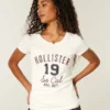 Tricou cu logo grafic Holiday Vault Release Tricou cu logo grafic Holiday Vault Release