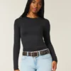 Tricou pentru bebeluși cu mâneci lungi, fără cusături Tricou pentru bebeluși cu mâneci lungi, fără cusături