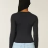 Tricou pentru bebeluși cu mâneci lungi, fără cusături Tricou pentru bebeluși cu mâneci lungi, fără cusături