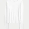 Tricou pentru bebeluși cu mâneci lungi, fără cusături Tricou pentru bebeluși cu mâneci lungi, fără cusături