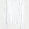 Tricou pentru bebeluși cu mâneci lungi, fără cusături, cu guler pătrat Tricou pentru bebeluși cu mâneci lungi, fără cusături, cu guler pătrat