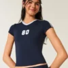 Tricou pentru copii Gilly Hicks Active Graphic Tricou pentru copii Gilly Hicks Active Graphic