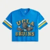 Universitatea din California, Los Angeles, tricou de fotbal cu grafică Bruins Universitatea din California, Los Angeles, tricou de fotbal cu grafică Bruins