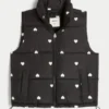 Vestă matlasată cu model inimioare Vestă matlasată cu model inimioare